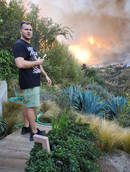 PACIFIC PALISADES, CA - JANUARY 7: Spencer Pratt is seen watching the wildfire as it approaches his house on January 7, 2025 in Pacific Palisades, California.